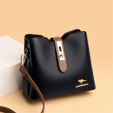 Amira Lock Strap Crossbody - Vellegra