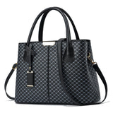 Heritage Check Tag Satchel - VELLEGRA