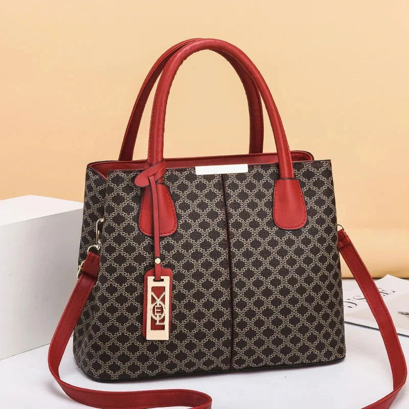 Monogram Emblem Top Handle Tote - VELLEGRA