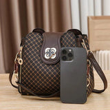 Monogram Flip Clasp Bucket Crossbody - VELLEGRA