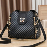 Monogram Flip Clasp Bucket Crossbody - VELLEGRA