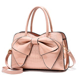 Bellavue Gloss Bow Handbag – Chic Patent Leather Shoulder Bag