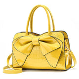 Bellavue Gloss Bow Handbag – Chic Patent Leather Shoulder Bag