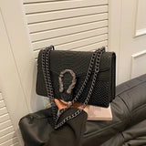Nerika Serpent Chain Bag
