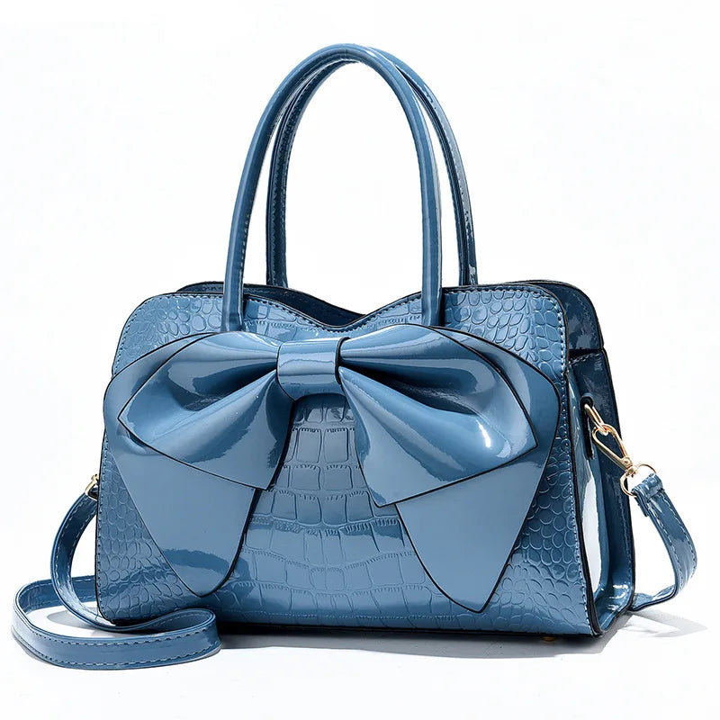 Bellavue Gloss Bow Handbag – Chic Patent Leather Shoulder Bag