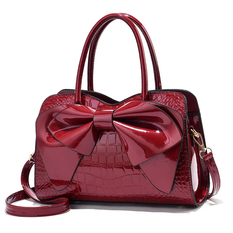 Bellavue Gloss Bow Handbag – Chic Patent Leather Shoulder Bag