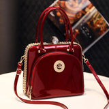 Serelina Crystal Shell Bag – Glossy Leather Evening Handbag