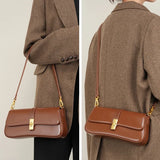 Noëlle Compact Sculpted Leather Baguette Bag