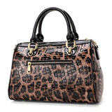 Valmira Fierce Embossed Leather Boston Bag - Vellegra
