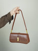 Noëlle Compact Sculpted Leather Baguette Bag